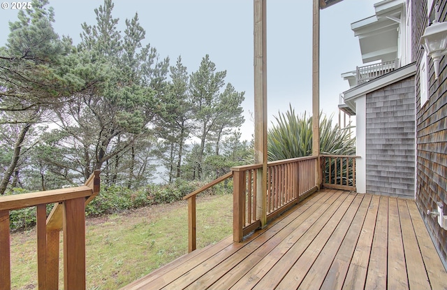deck featuring a yard