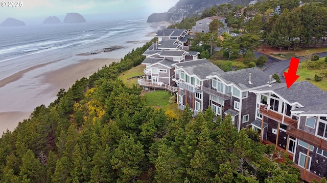 aerial view featuring a beach view and a water view
