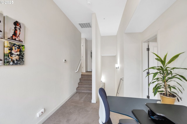 home office with light colored carpet