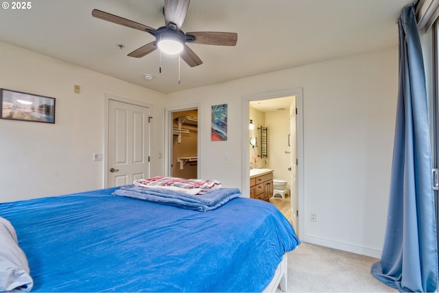 laundry room with stacked washer and dryer and light colored carpet