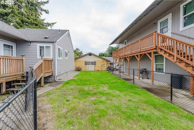 view of yard featuring a wooden deck