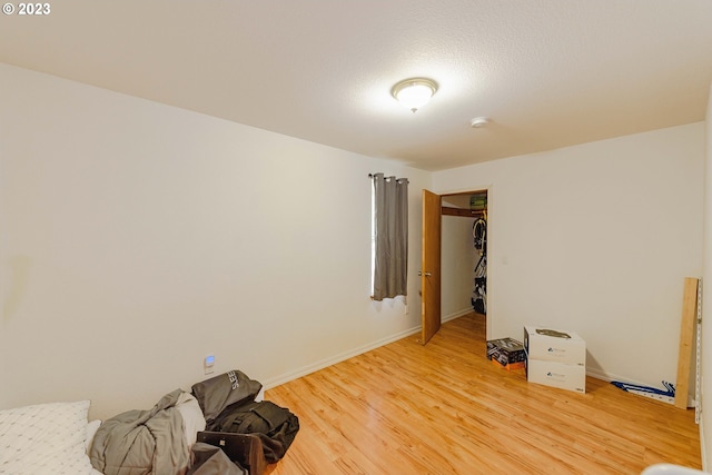 miscellaneous room with wood-type flooring