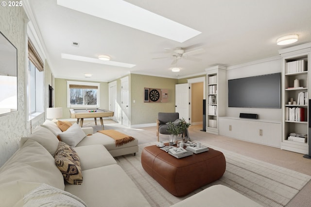 living room with crown molding, light colored carpet, pool table, and a skylight