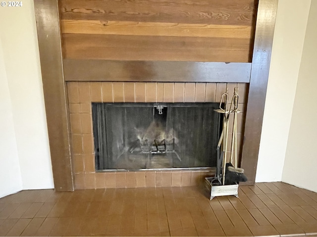 room details with a tiled fireplace