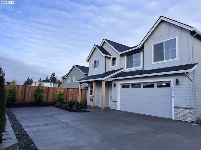 1006 NE 17th Ave, Canby, OR 97013 - view of front of property featuring board and batten siding, concrete driveway, and a garage