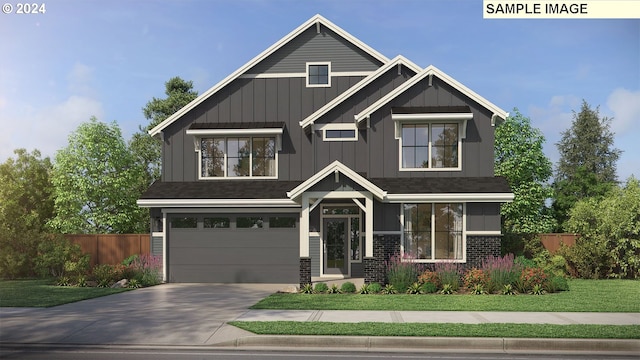 craftsman inspired home with a front yard and a garage