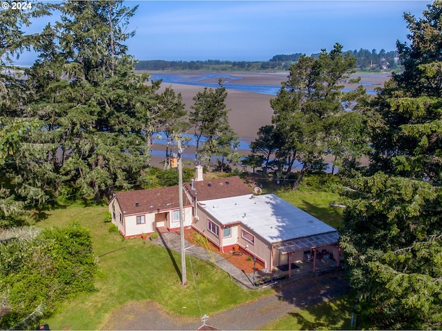 drone / aerial view with a water view