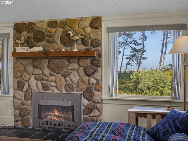 interior space featuring a stone fireplace