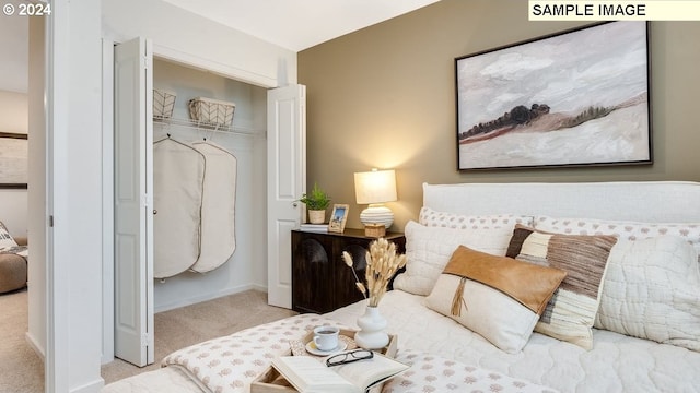 bedroom with light colored carpet and a closet