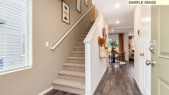 interior space with dark wood-type flooring