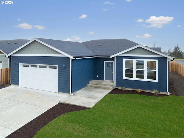 ranch-style home featuring a front yard and a garage