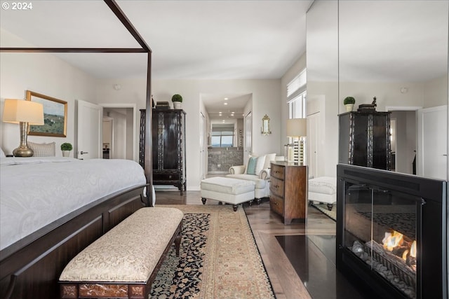 bedroom featuring hardwood / wood-style flooring