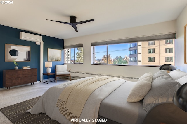 carpeted bedroom with a baseboard radiator, ceiling fan, and an AC wall unit