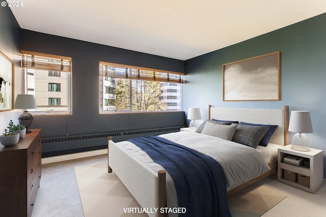 bedroom featuring light carpet and radiator