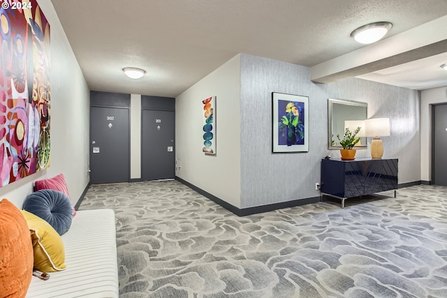 2323 SW Park Pl Unit 302, Portland, OR 97205 - common area featuring a textured ceiling