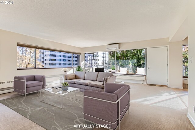 2323 SW Park Pl Unit 302, Portland, OR 97205 - carpeted living room with a wall mounted AC and baseboards