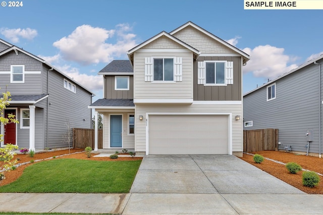 craftsman-style home with a front yard and a garage