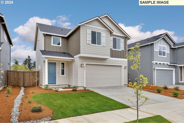 craftsman house with a garage and a front yard