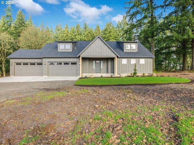 modern farmhouse style home featuring a garage