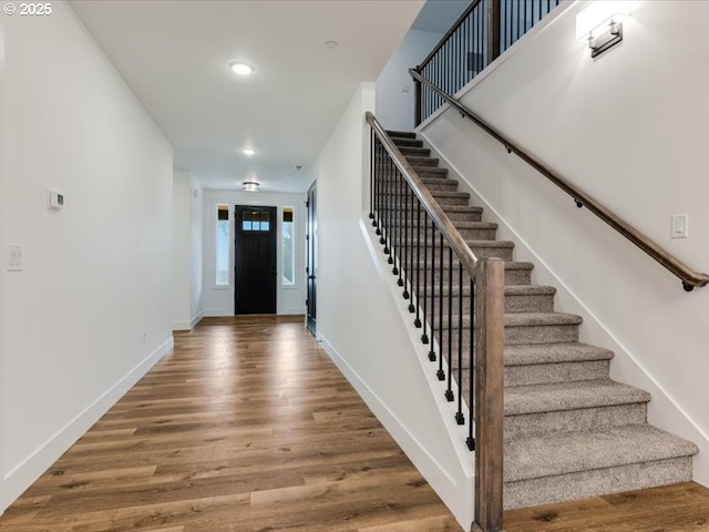 entrance foyer featuring hardwood / wood-style flooring