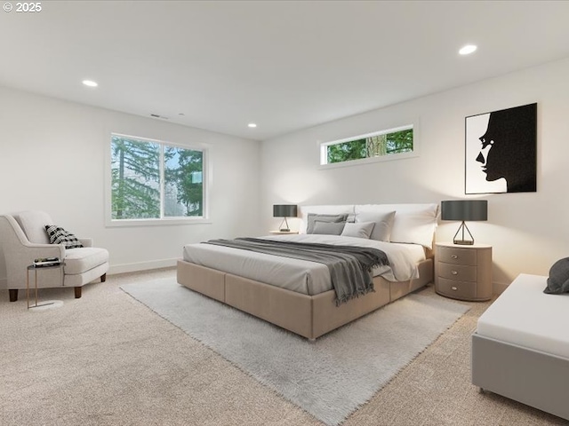 carpeted bedroom with multiple windows