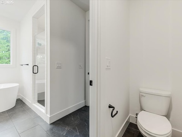 bathroom featuring toilet and plus walk in shower