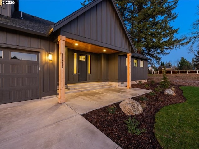 property entrance featuring a garage