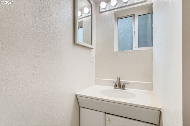 5108 NE Glisan St, Portland, OR 97213 - bathroom featuring vanity and a textured wall