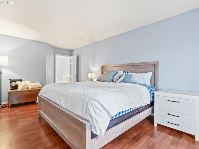 bedroom featuring dark hardwood / wood-style floors