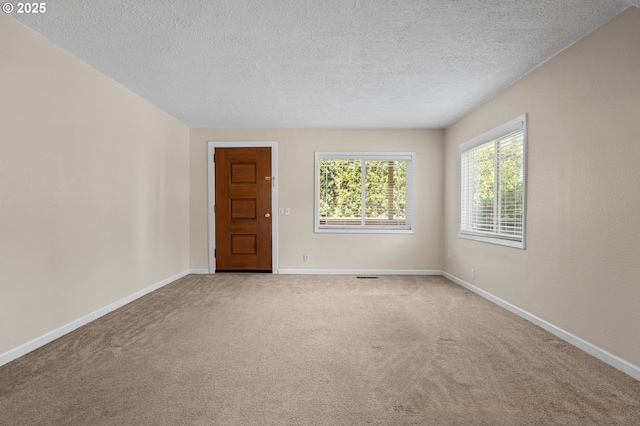 5706 NE 58th Ct, Vancouver, WA 98661 - spare room with a textured ceiling and carpet floors