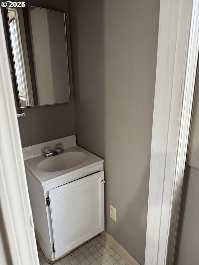 bathroom featuring tile patterned floors and vanity