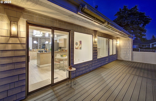 view of deck at twilight