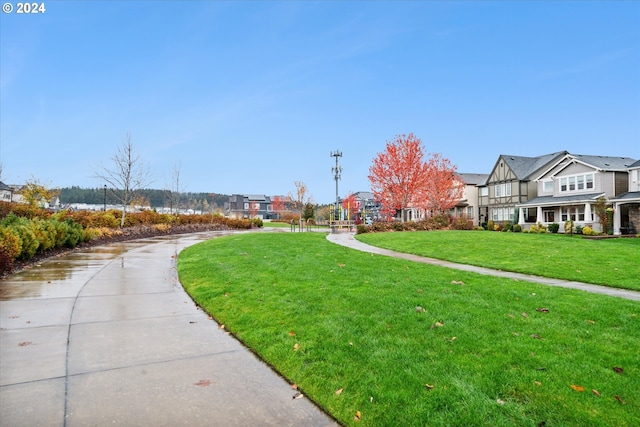 surrounding community featuring a lawn