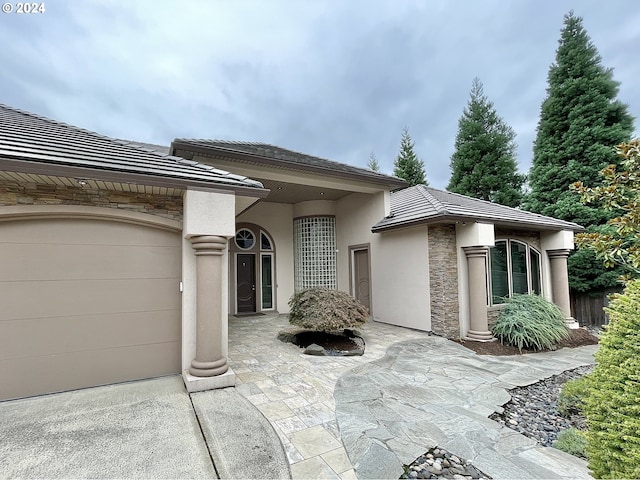 view of front of home with a garage