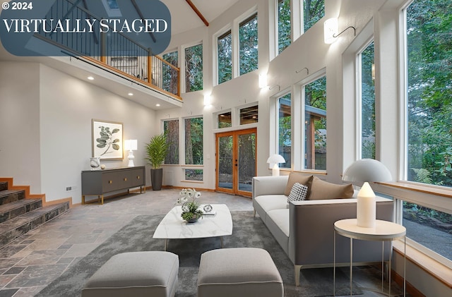 unfurnished sunroom featuring french doors