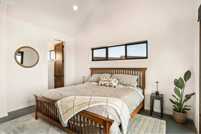 bedroom featuring lofted ceiling