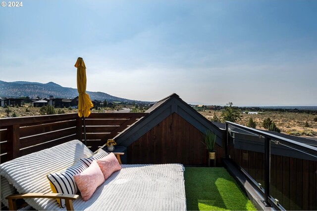 balcony featuring a mountain view