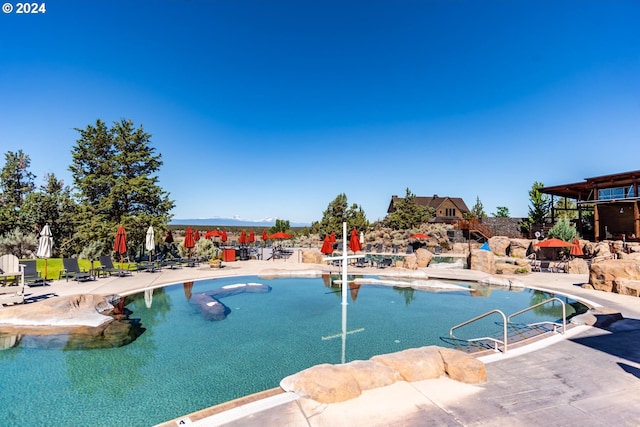 view of swimming pool featuring a patio