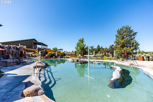 view of pool featuring a patio