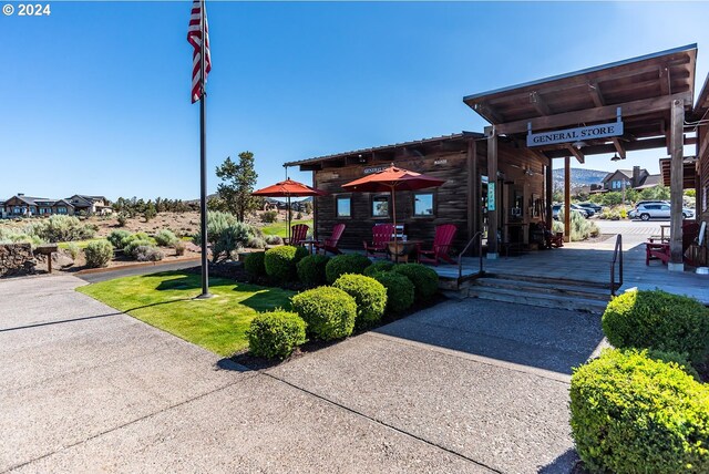 surrounding community with a patio area