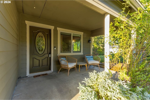 doorway to property featuring a porch