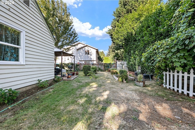 view of yard featuring a fenced backyard