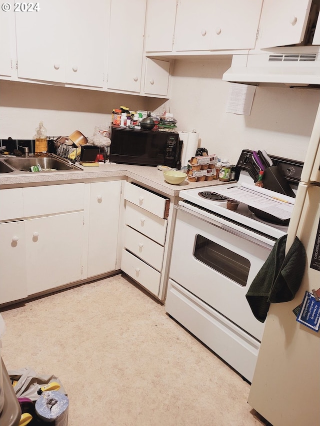 kitchen featuring white range with electric stovetop, sink, white cabinetry, and extractor fan