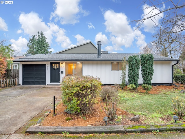 single story home with a garage