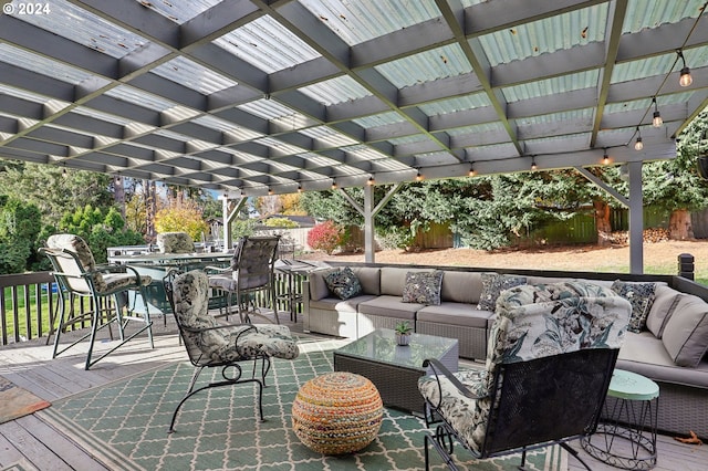 deck with an outdoor living space and a pergola