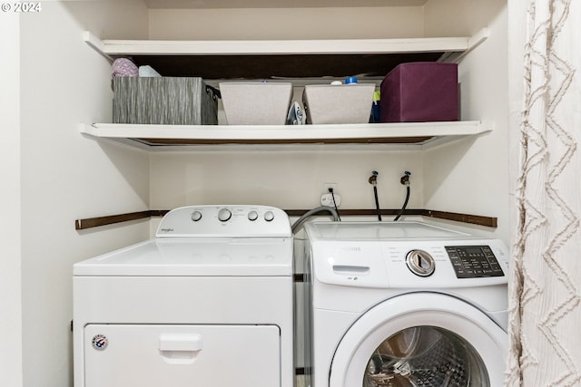 laundry room featuring separate washer and dryer