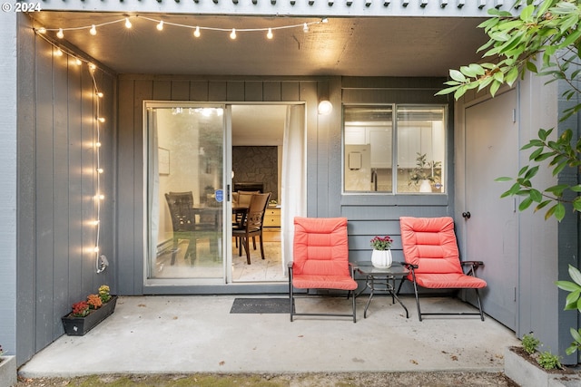 property entrance featuring a patio