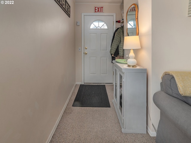 doorway with light carpet