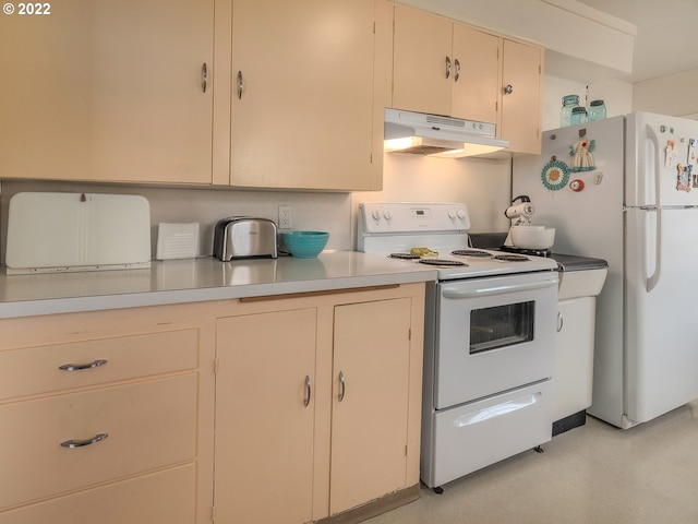 kitchen featuring white appliances