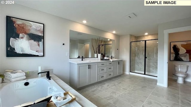 full bathroom with shower with separate bathtub, vanity, toilet, and tile patterned floors